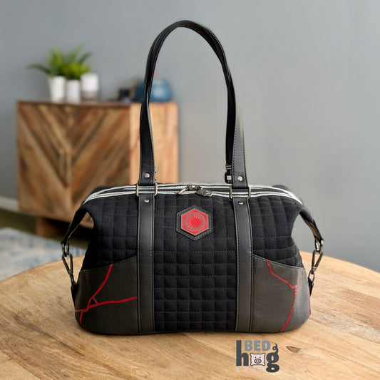 Inner Conflict Quilted Duffle Bag